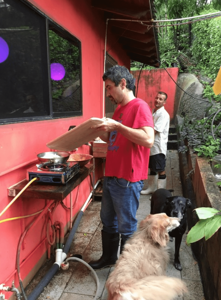 A man cooking with Homebiogas stove in Costa Rica