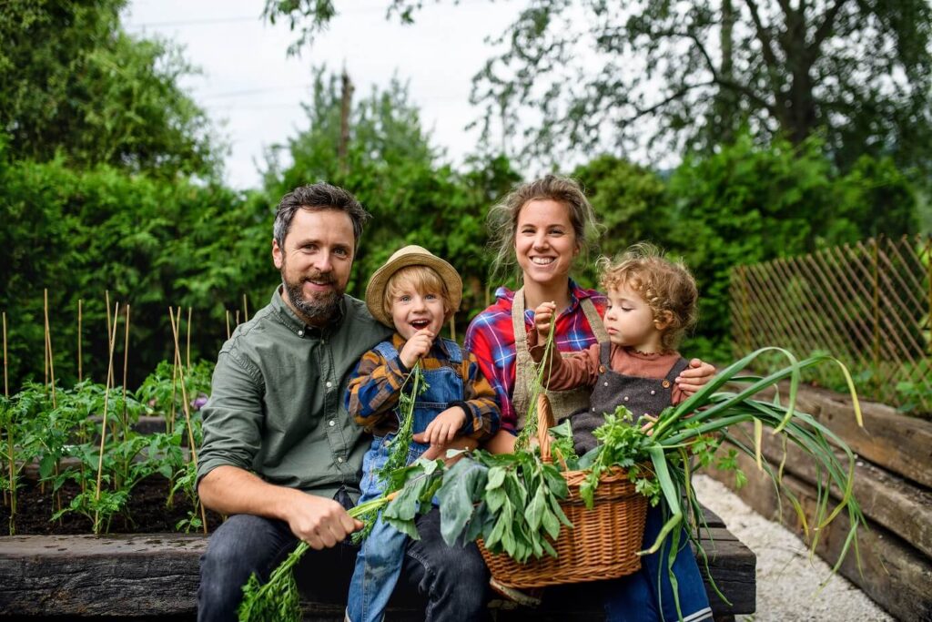 A family with vegetables from the garden